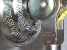 Close-up of back cup-note beveled lug, early dates